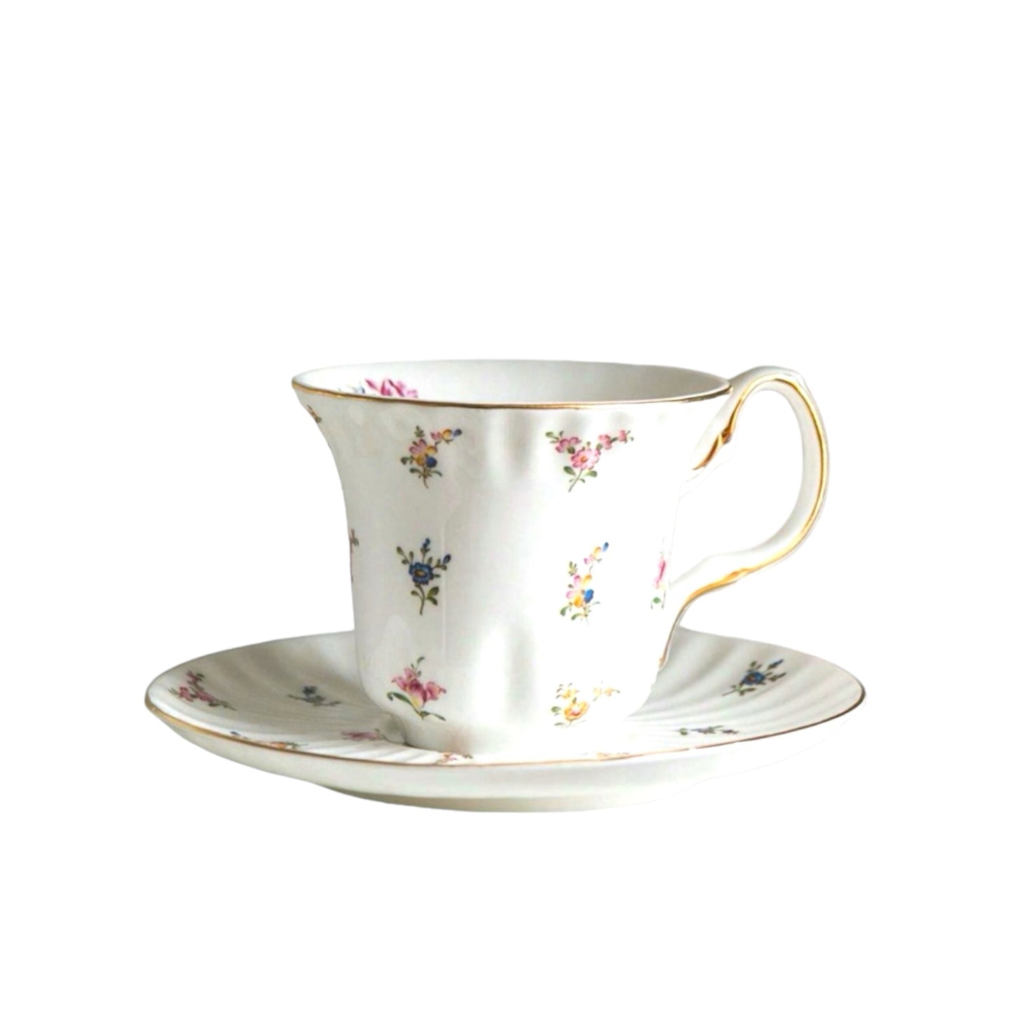 A cup of coffee with flowers